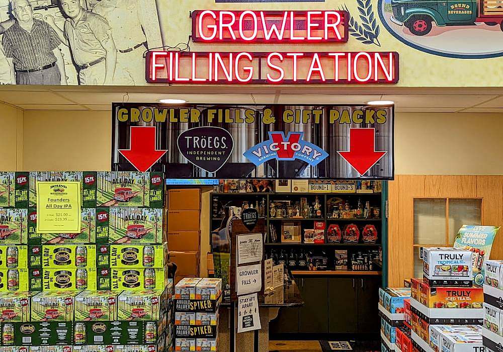 A store with a sign that says growler filling station.