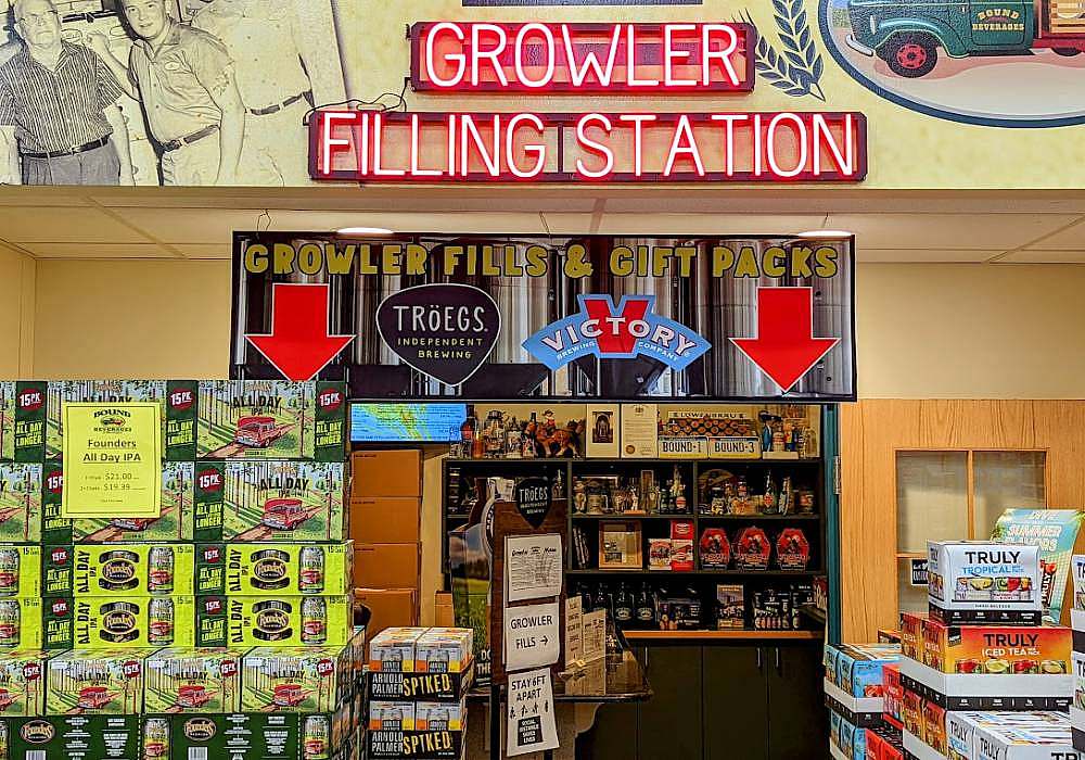 A store with a sign that says growler filling station.
